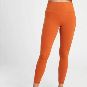 Athleta Salutation Stash Pocket II 7/8 Tights Canyon Orange {531321}